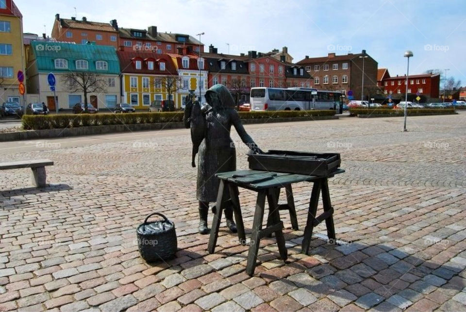 city square statue town by paula