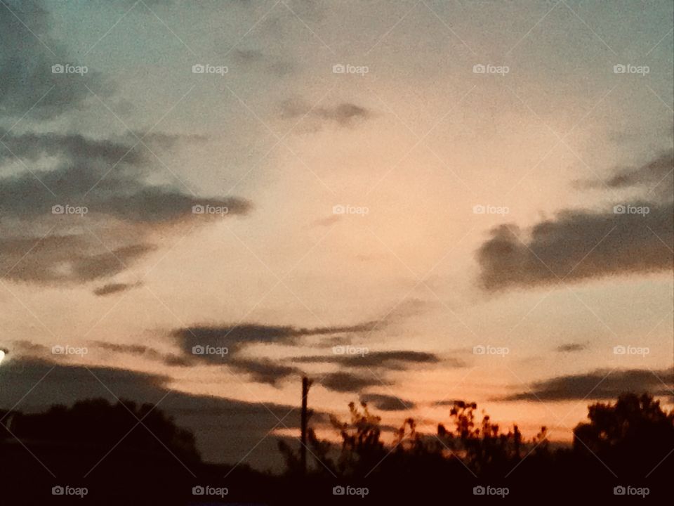 Morning Sunrise getting closer as more light is passing through the thinning Clouds for A Beautiful Days Approach. 