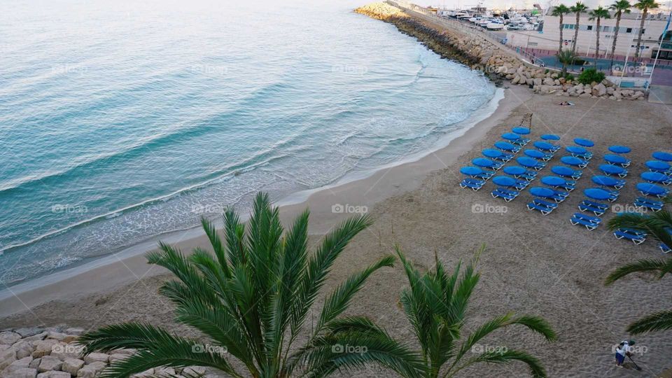 Beach#sea#view#parasols#palms