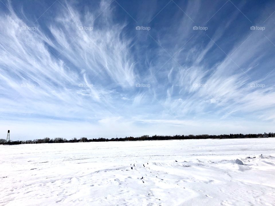 Beautiful sky over a frozen lake 