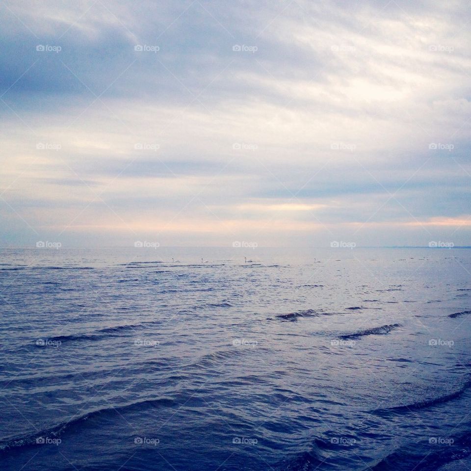 sky water baltic sea waves by omiata