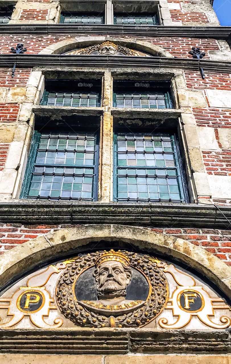 Detail of 16th century House of Crowned Heads (Huis van de Gekroonde Hoofden) featuring 14 busts of the Counts of Flanders - Burgstraat, Ghent, Belgium. Original name: “In de Draecke”