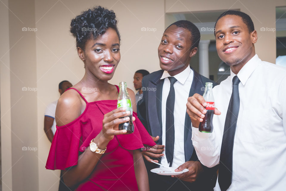 African friends enjoying cold drink