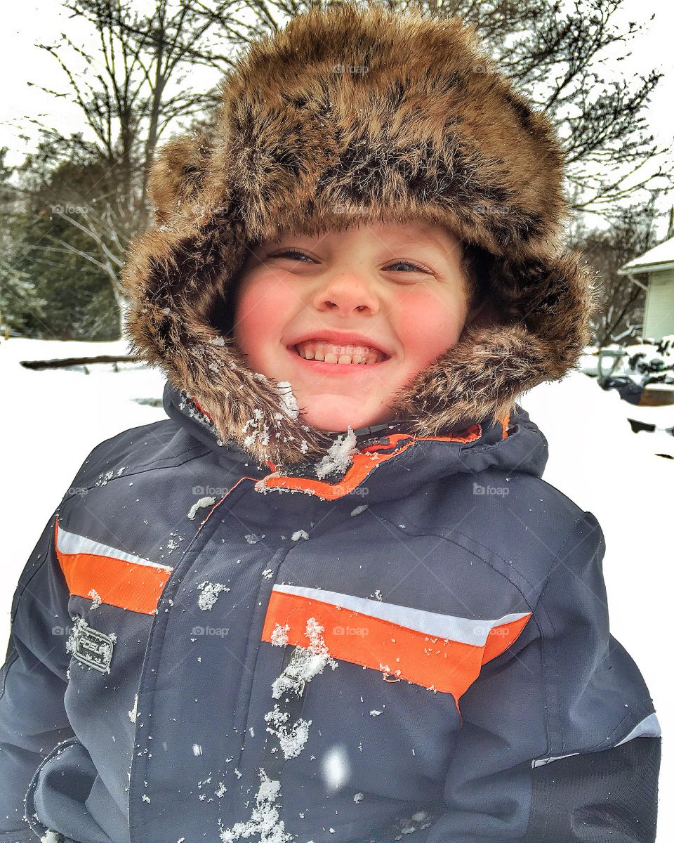 Portrait of boy in winter