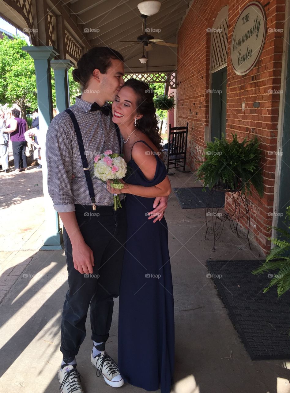 Tow cute couple standing together