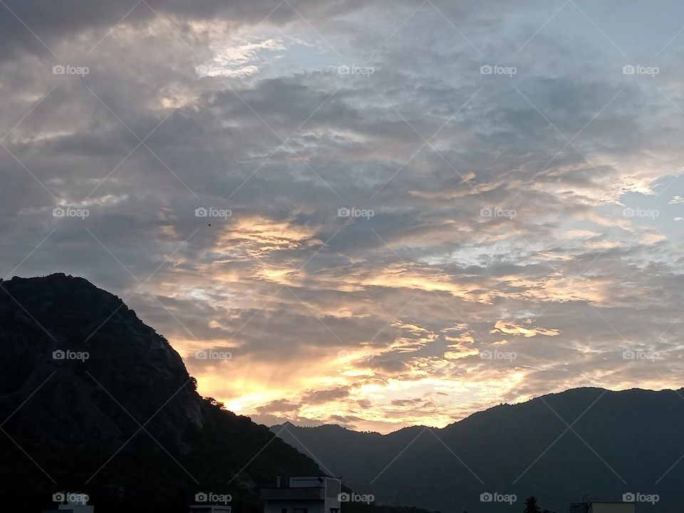 ravarma,  Golden clouds