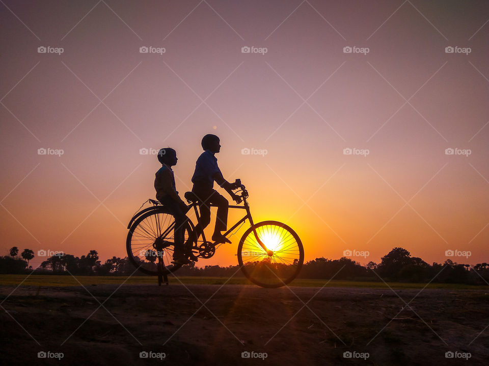 bicycling and sunset
