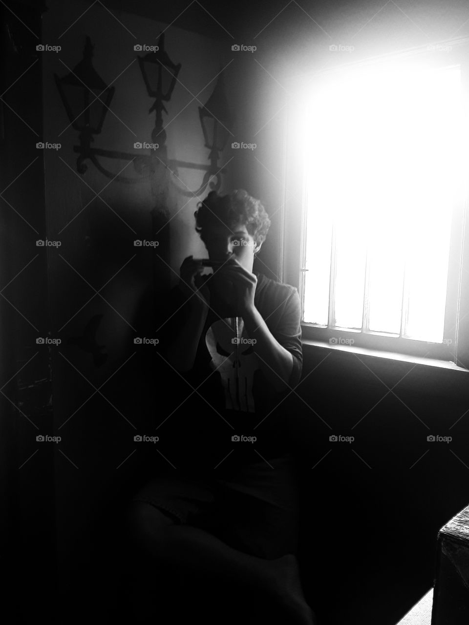 boy playing harmonica