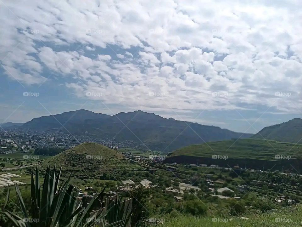 Glory be to God, the magnificent and picturesque view and the natural green trees are a view that is nothing more wonderful than it