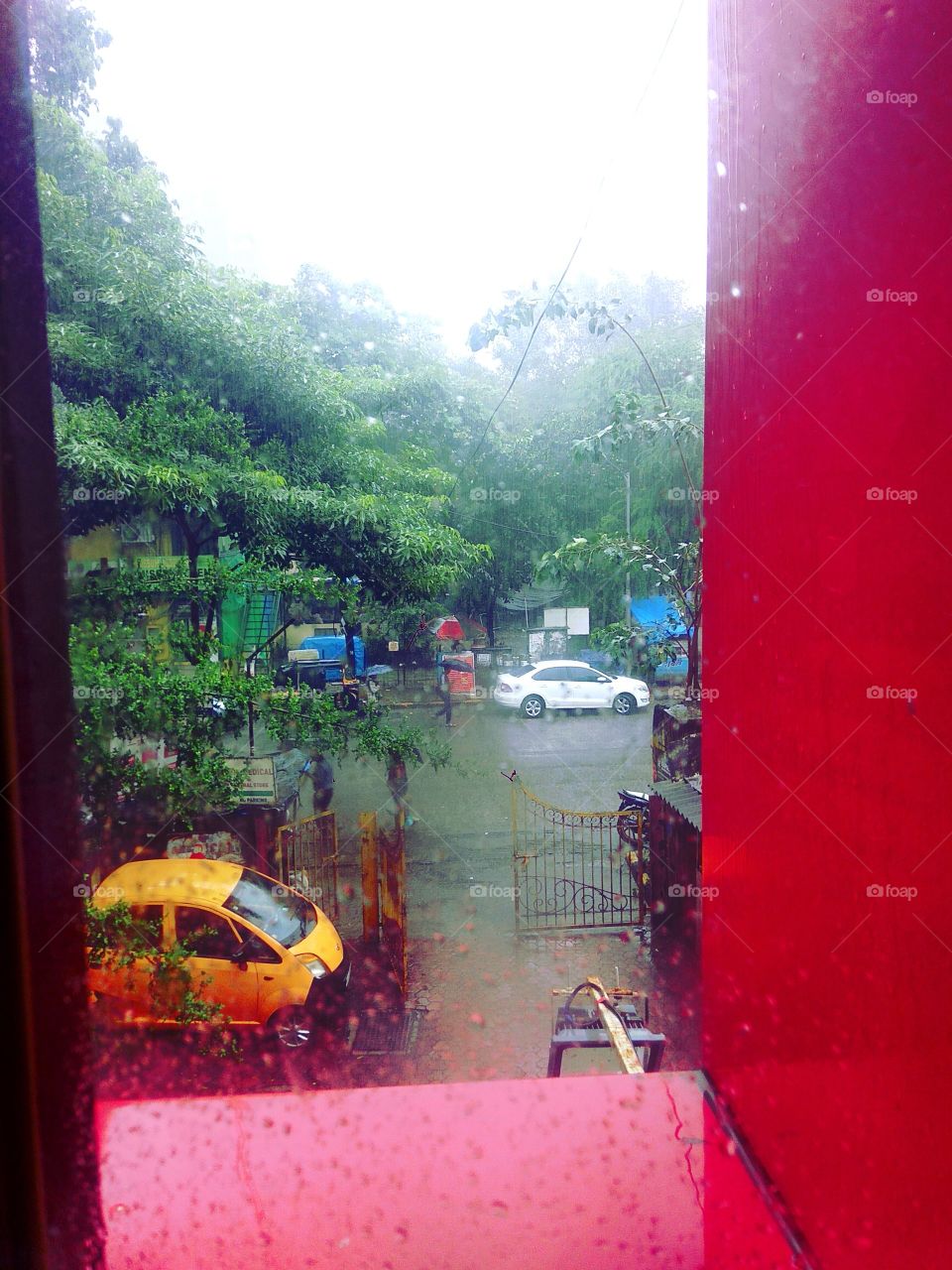 Window
rain 
car 
city
road