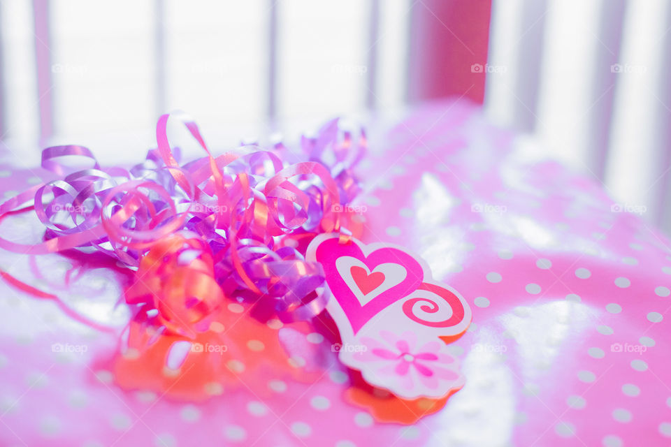 Purple Ribbon and a heart at a baby shower