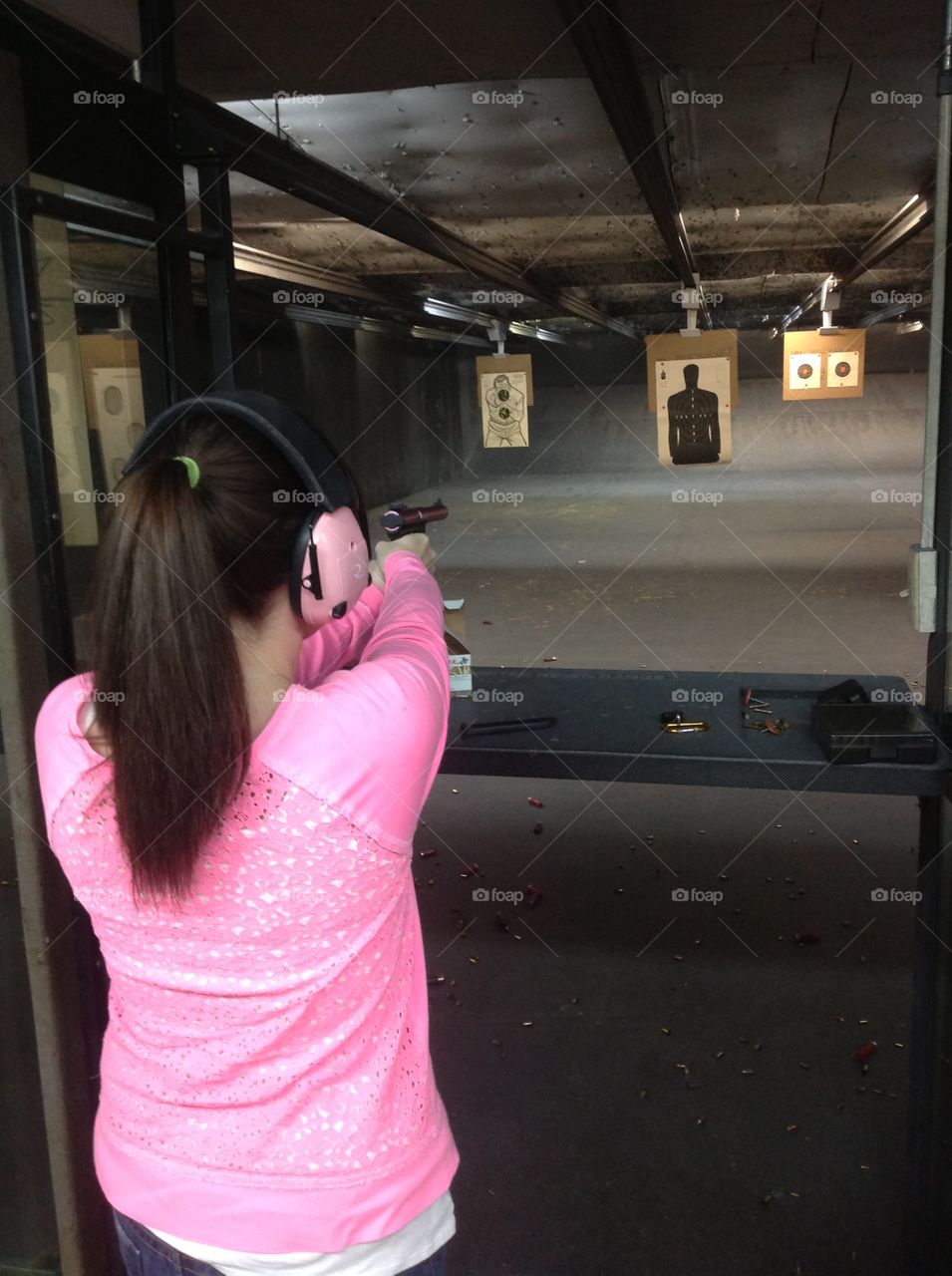 Self Defender. Woman at the shooting range