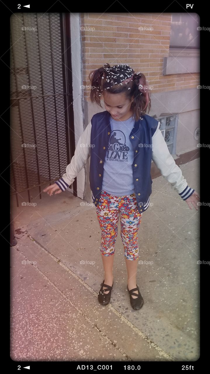 little girl outside city fun
