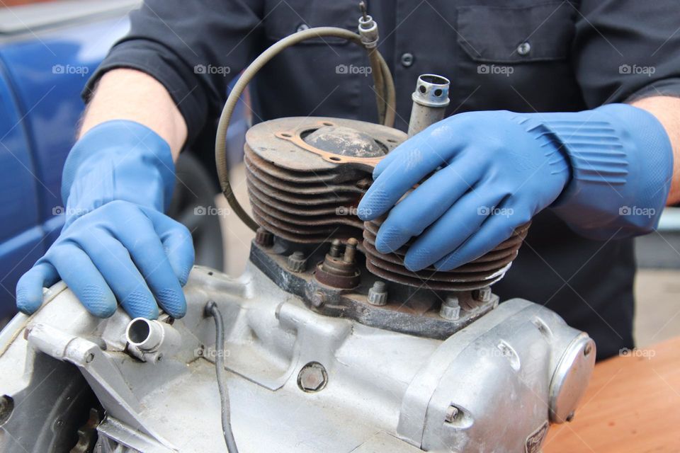 Mechanic working on engine