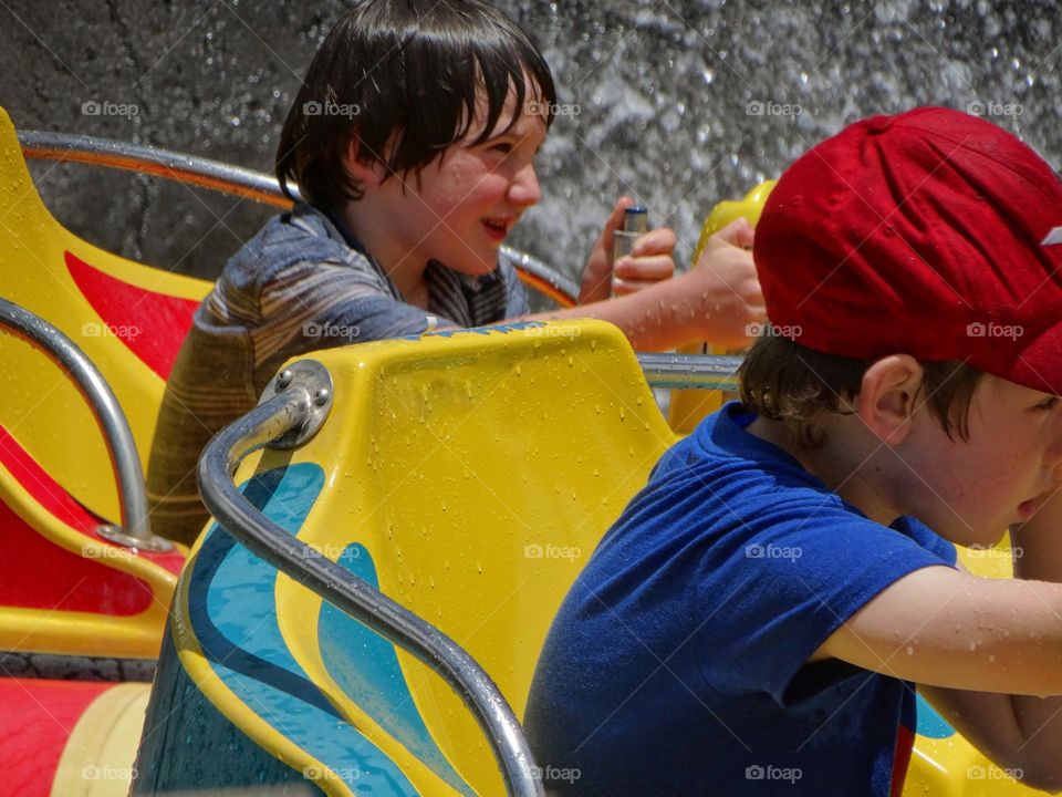 Kids Playing In Water