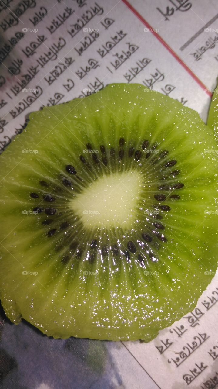 A slice piece is kiwi fruit