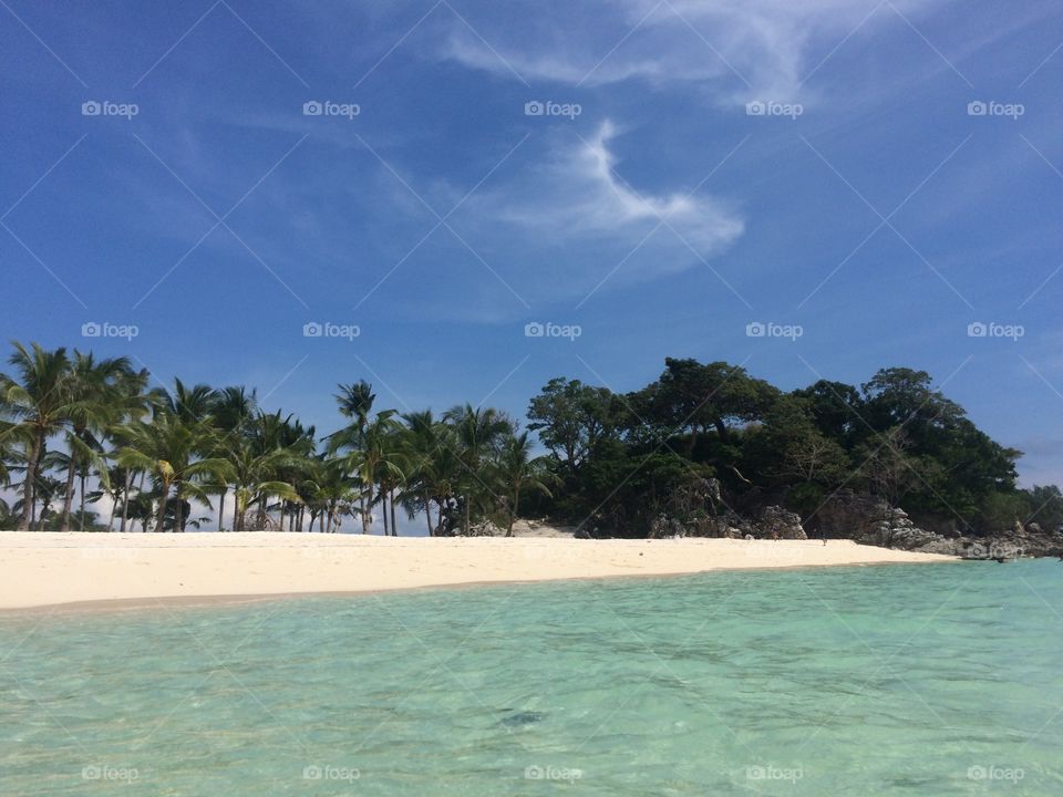 Calming view of beach with clear waters