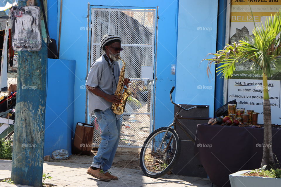 Belize City, man, Saxophon, music, street, bicycle, public, Caribbean, sunshine, daylight, artist, 