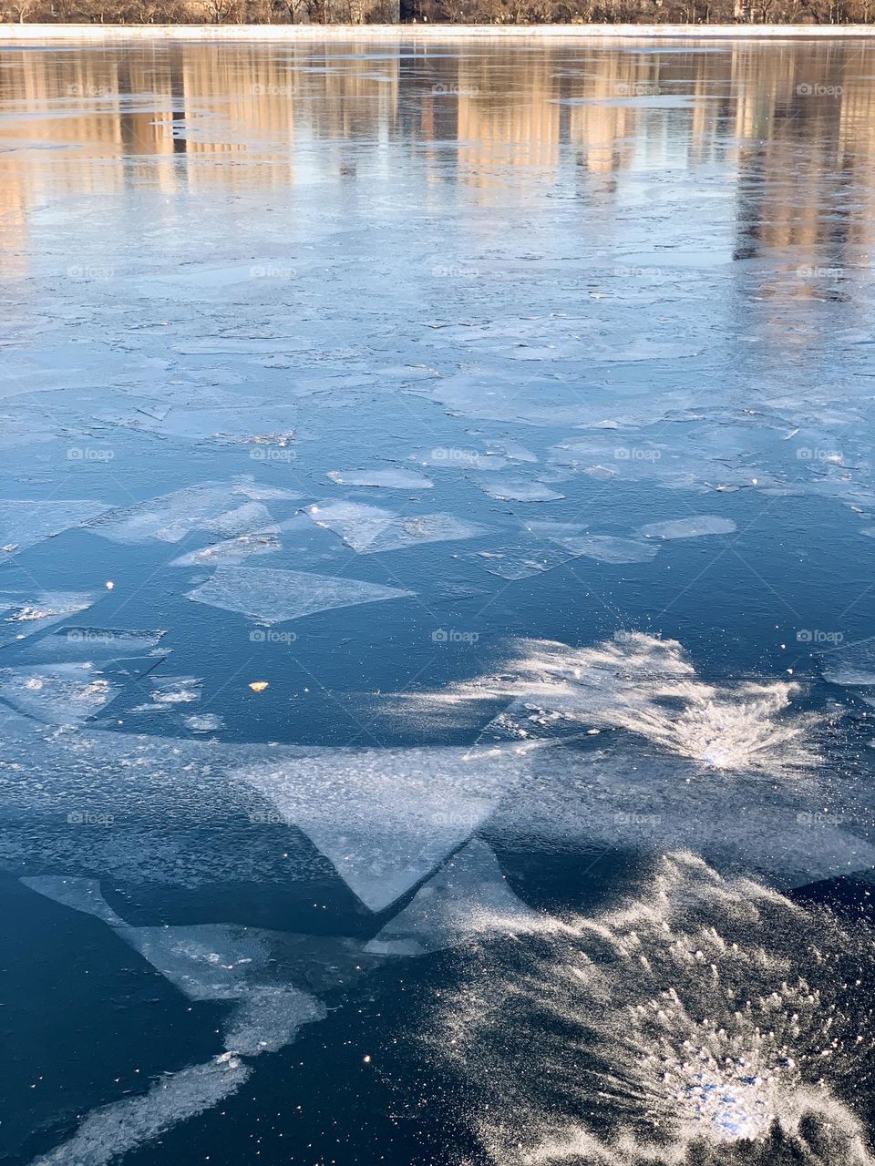 Snowflakes formed into triangular shaped on Jacqueline Kennedy Onassis Reservoir. 