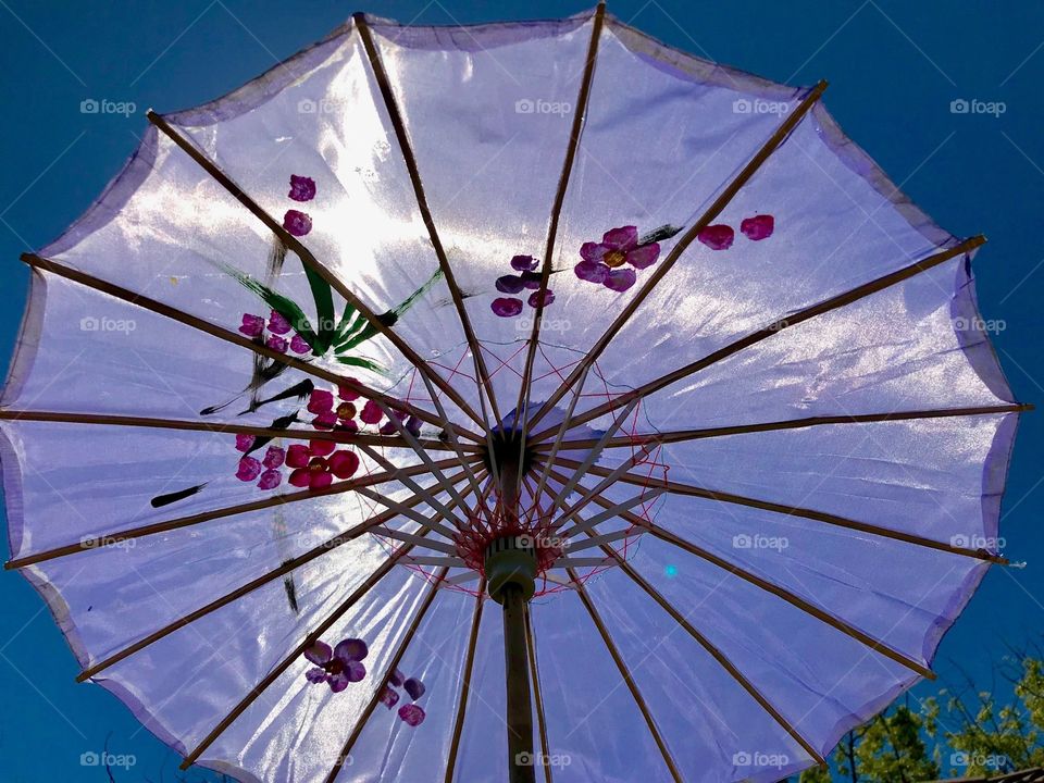 Parasol under the Midday Sun