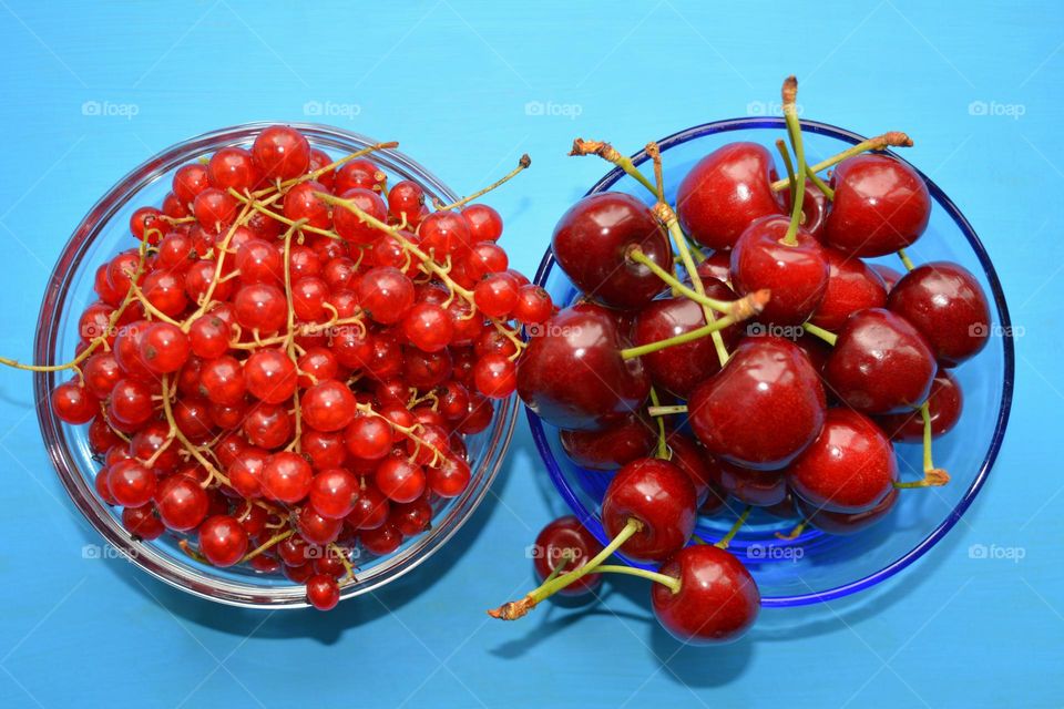 red berries cranberries and cherry on a plate tasty summer healthy food