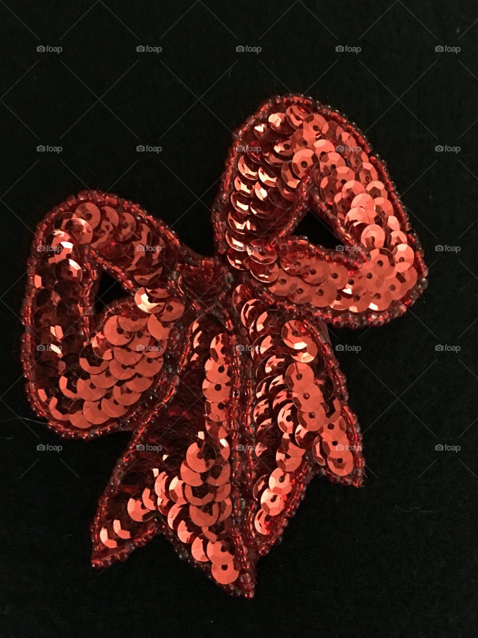 Large red sequin bow