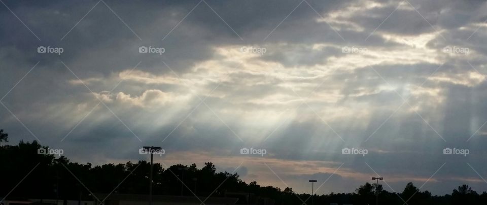 Shining through the clouds. Another time I stopped in traffic to snap a picture.