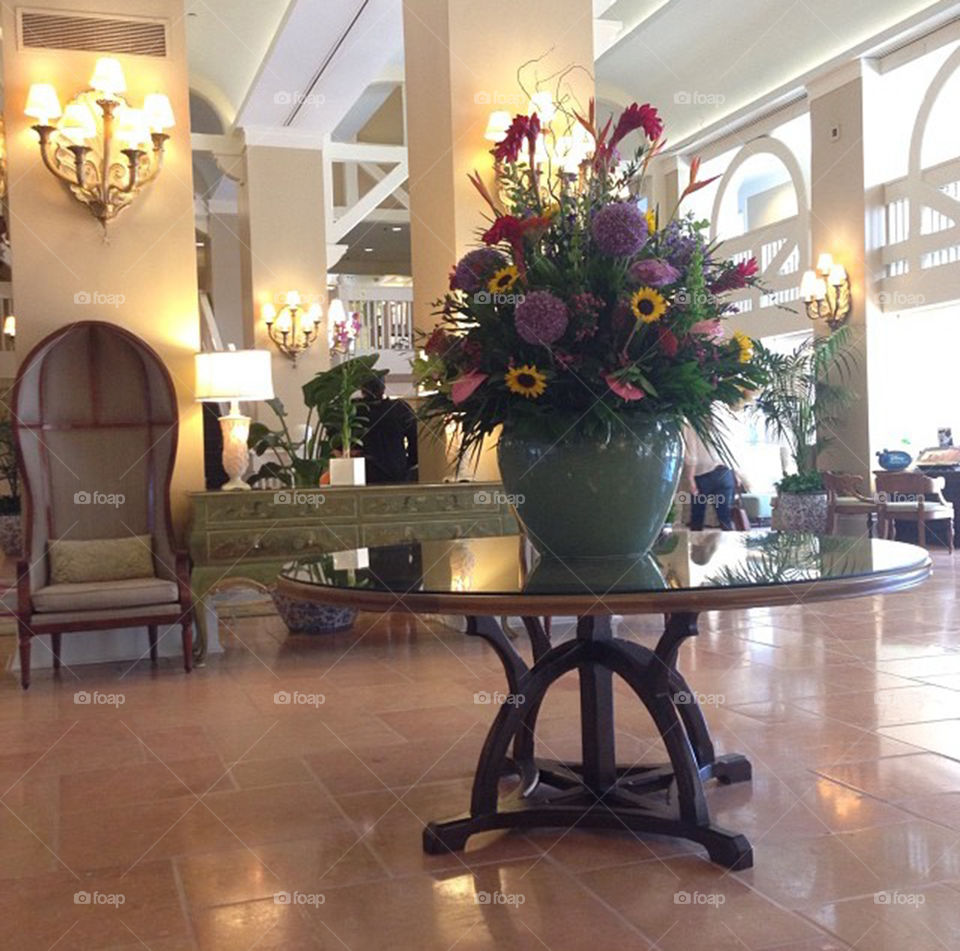Hotel Lobby. A beautiful flower arrangement in a gorgeous hotel lobby.