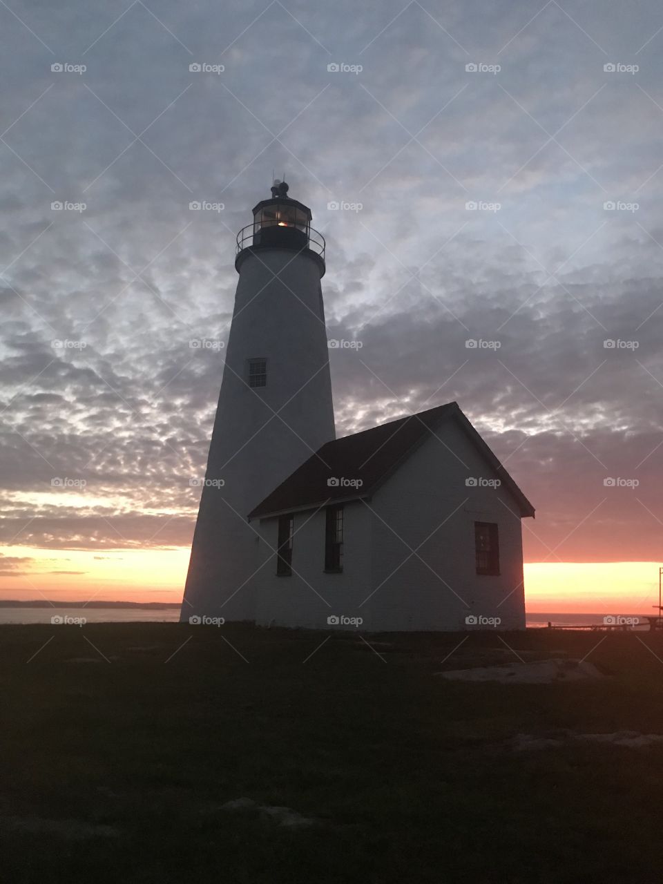 Sunrise behind the lighthouse