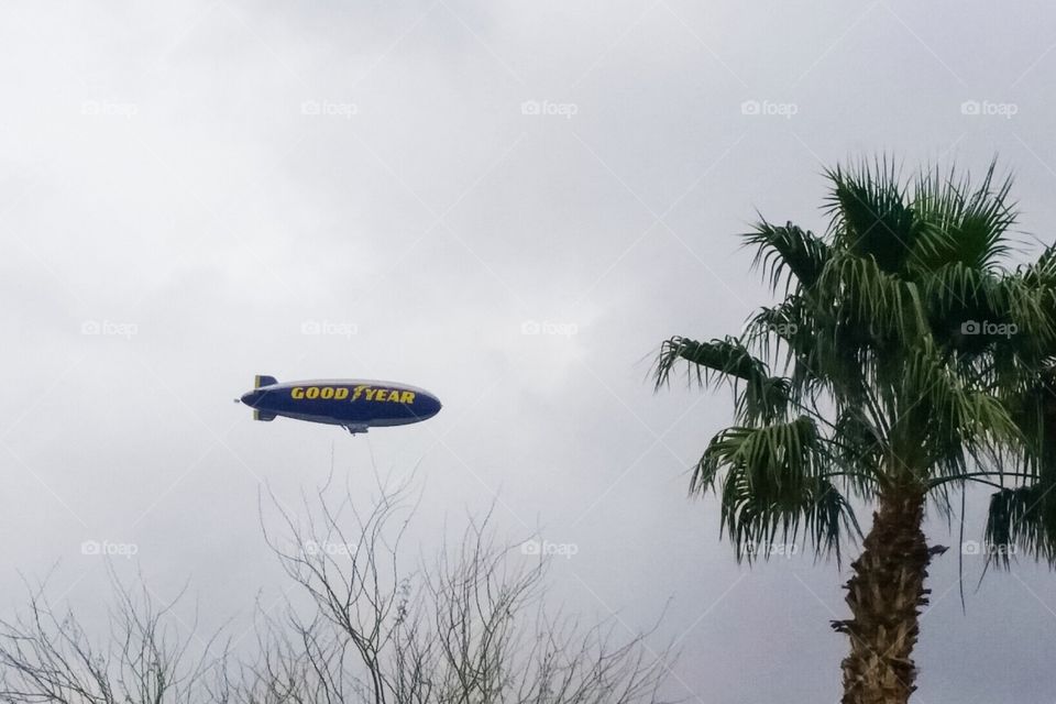 Goodyear Blimp in a cloudy sky