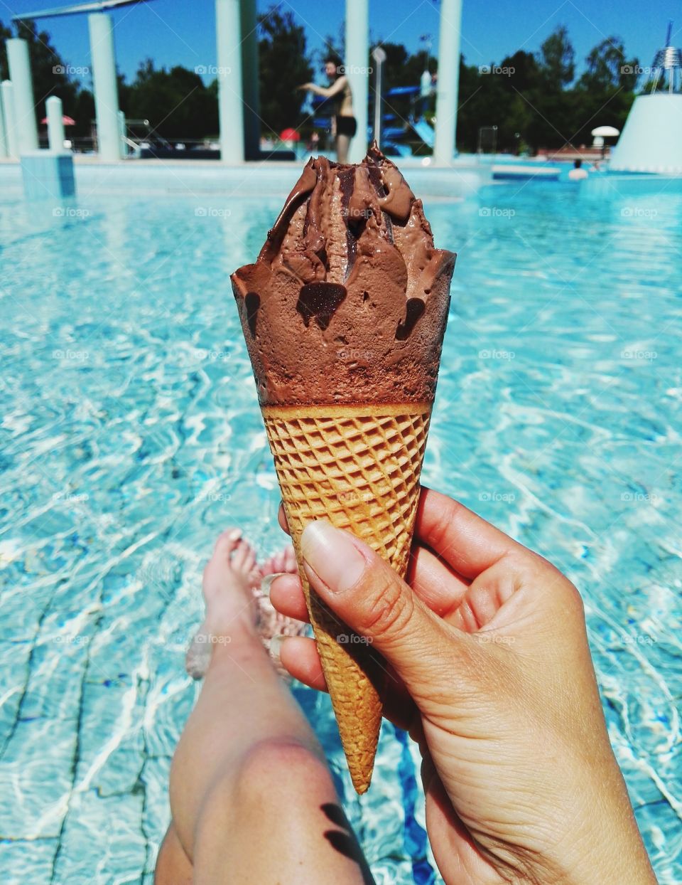 Eating ice cream at the pool on a hot summer day