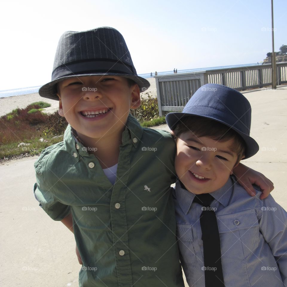 Smiling boys with hat