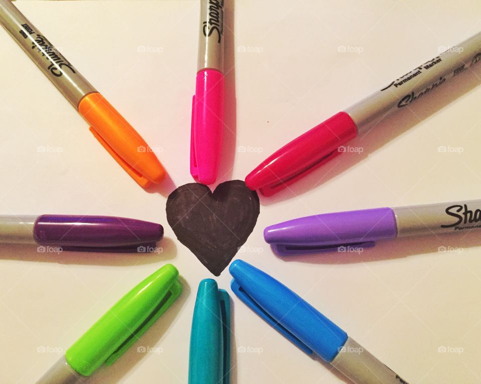 Love Art. A heart surrounded by different color sharpies 