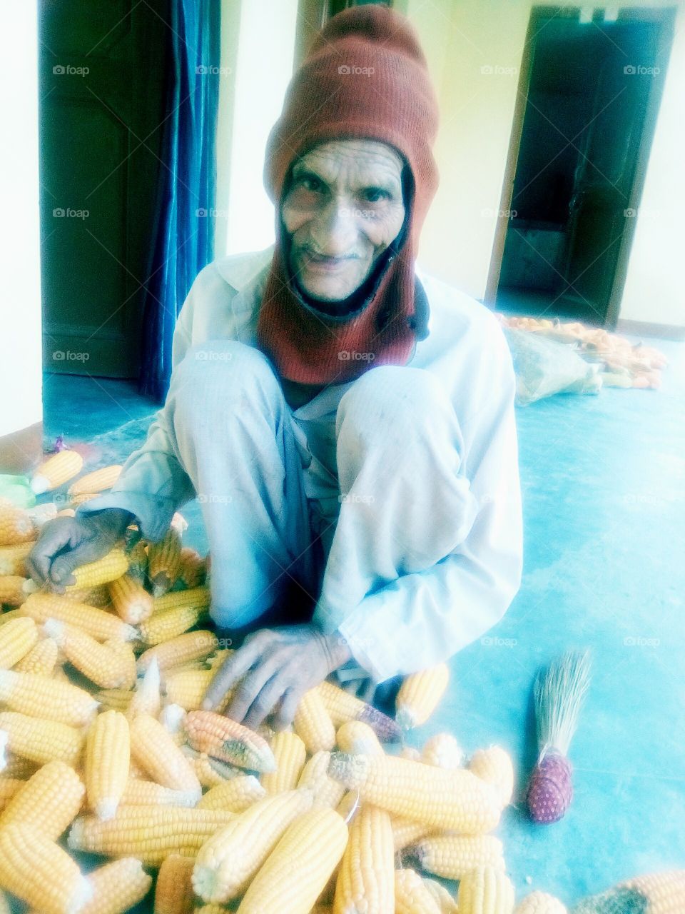 village old man works