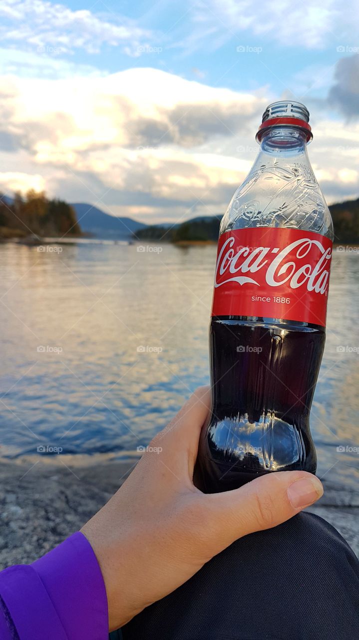 Drinking Coca-Cola
