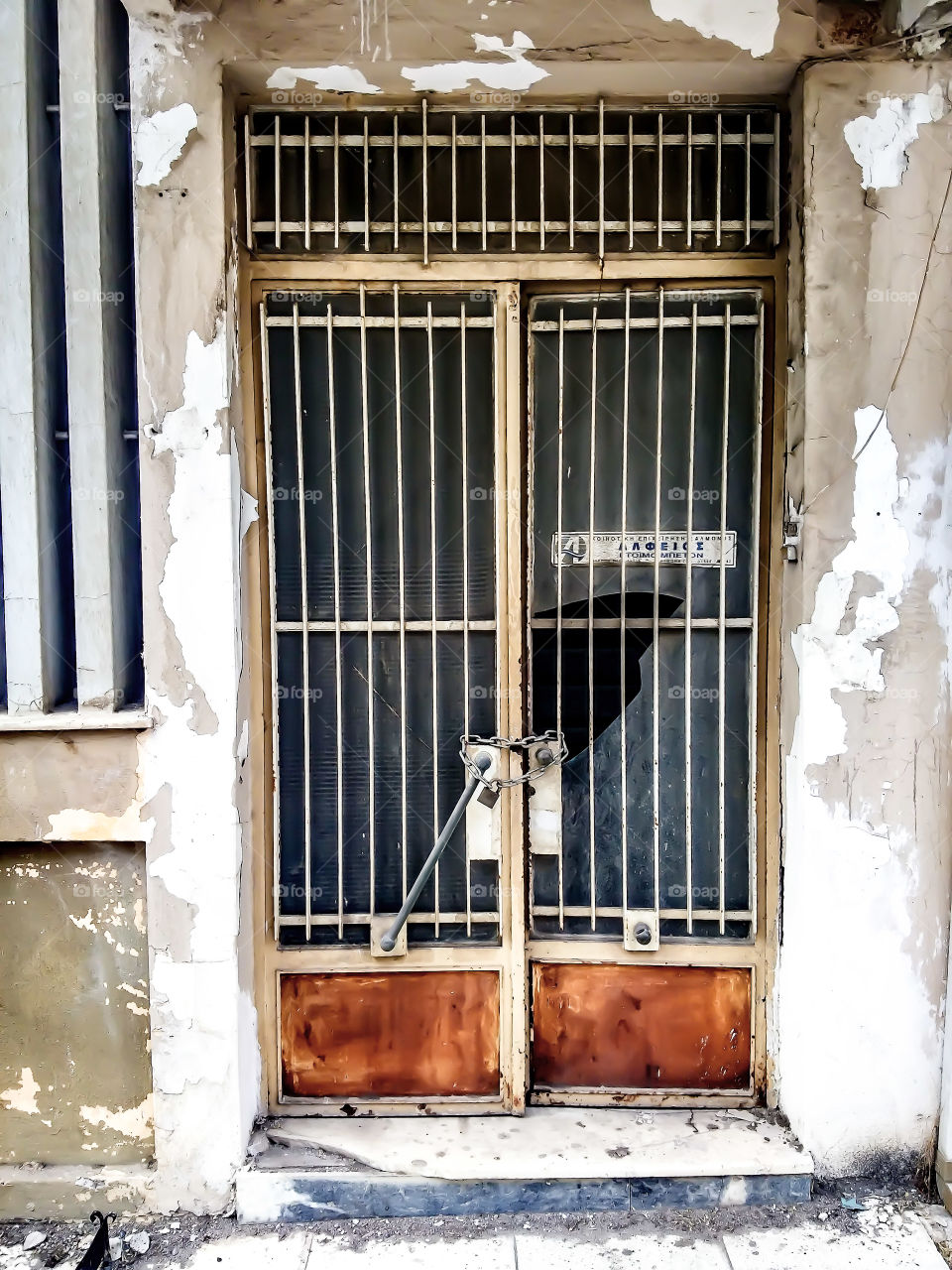 Old door with broken glass