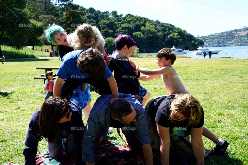 Family Building A Human Pyramid