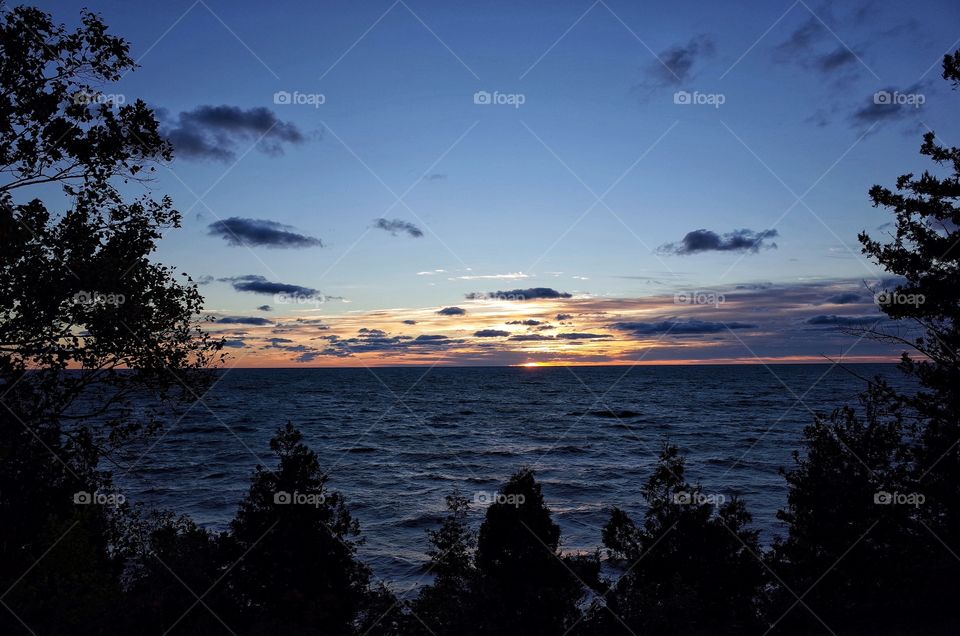 Scenic view of sunrise at sea