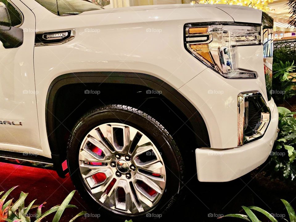 Cars with soul - undercarriage with red light - The 2023 Denali’s DURAMAX eye-catching exterior features many exclusives that help give the vehicle its signature look.