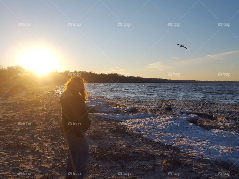 Woman standing at beach