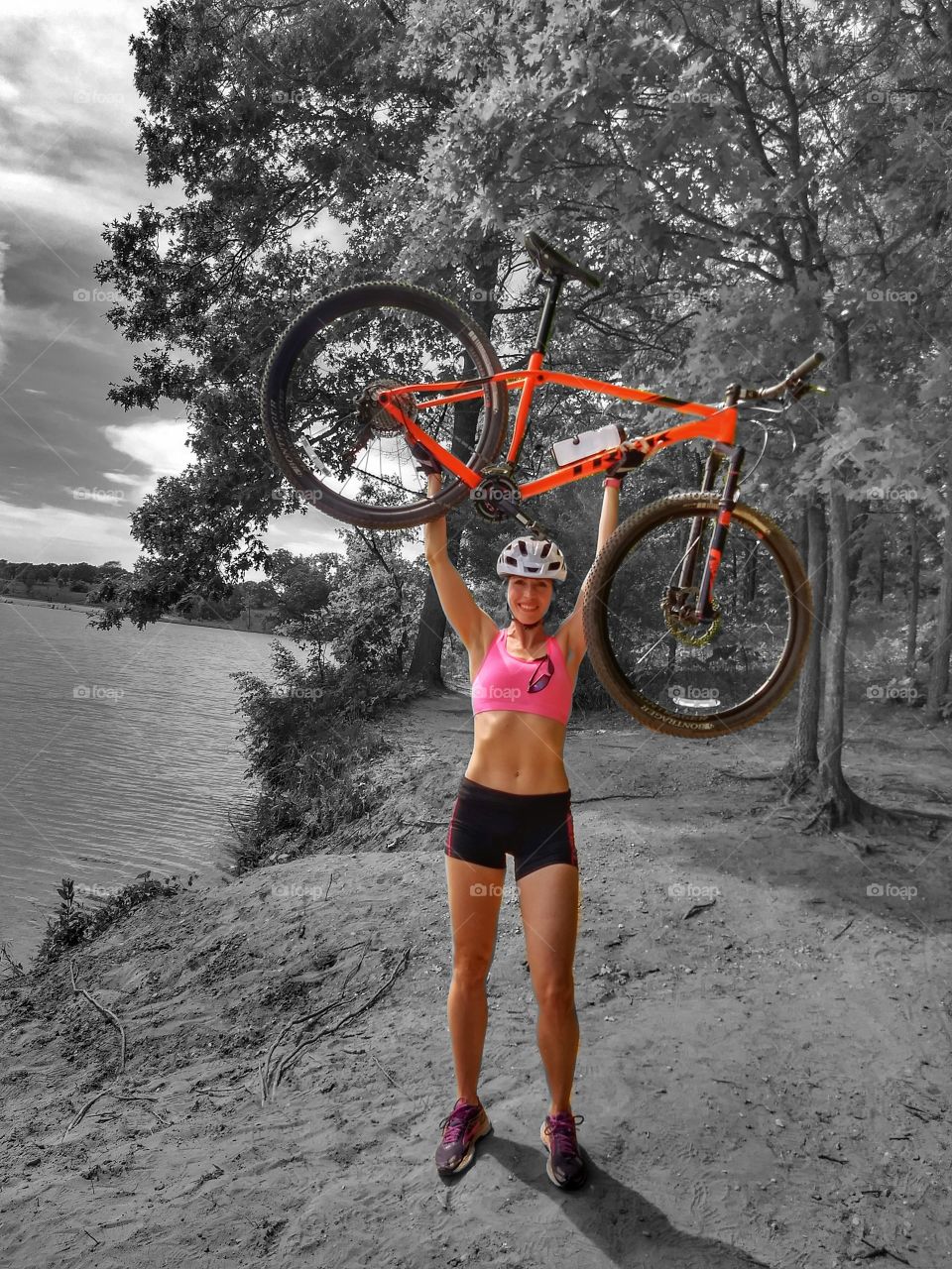 b&w color pop of beautiful woman cyclist