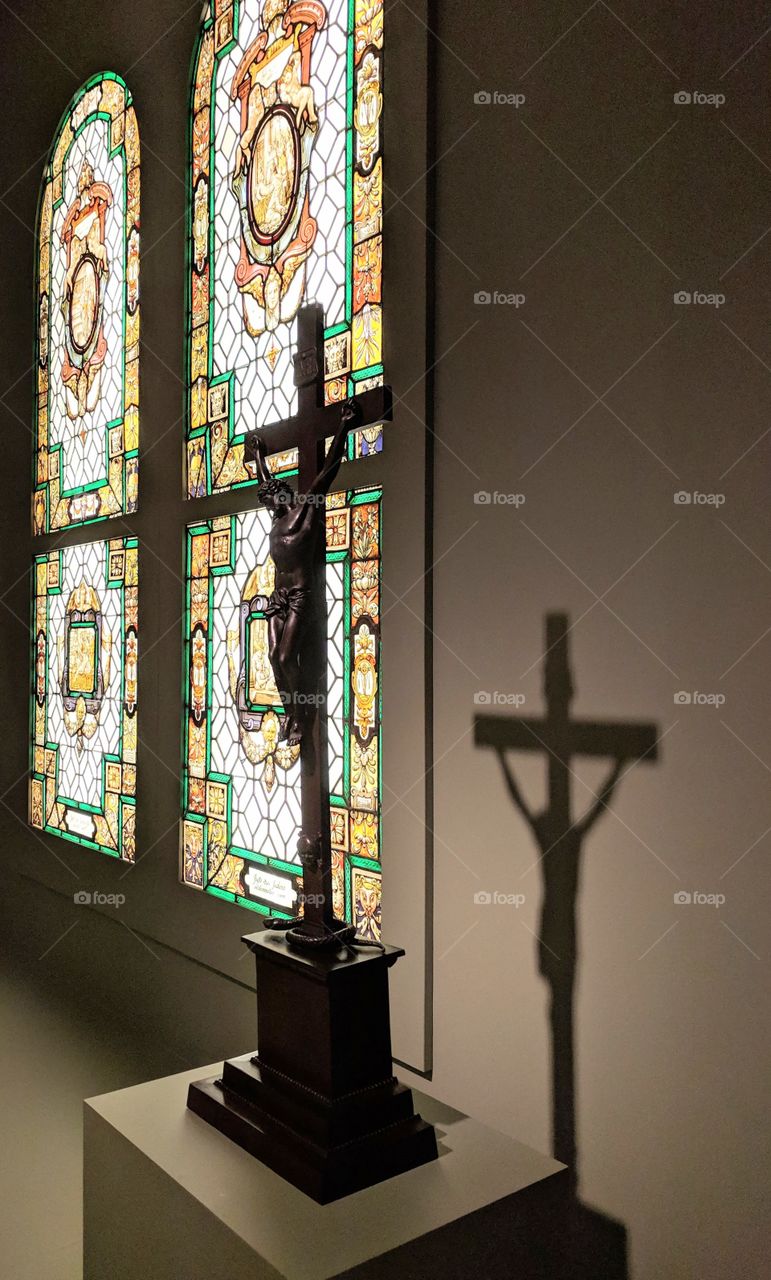 Stained glass windows and crucifix