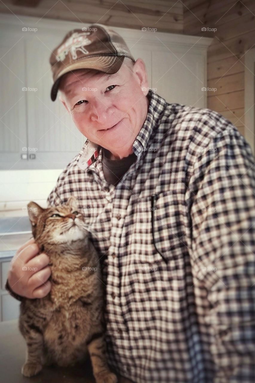 Happy man with his cat