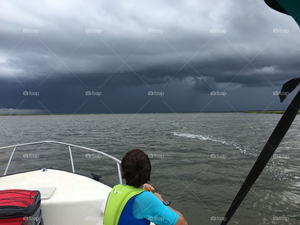 A storm came upon us while out boating so we headed back to shore. It was beautiful and a bit scary. 