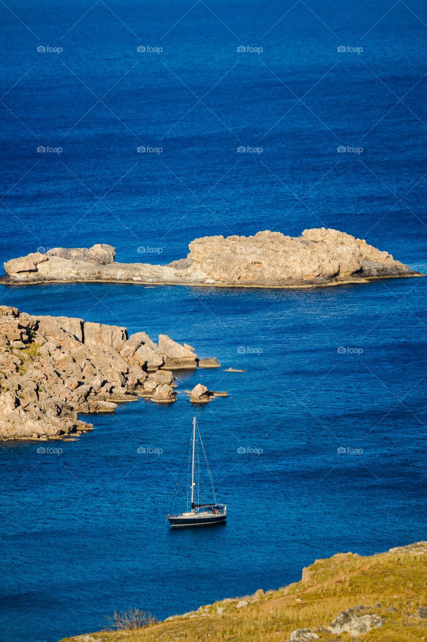 The bay of Lindos. Watching the bay of Lindos in the island of Rhodos Greece from above 