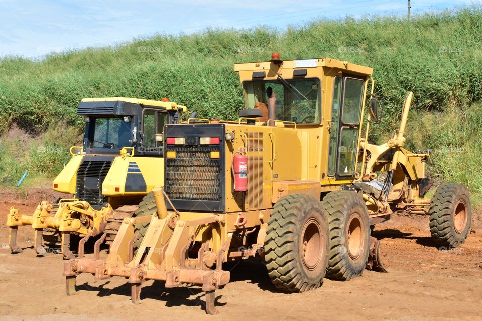 A Road Construction Site. It Is A Resting Day For All, Workers And Machined Alike.