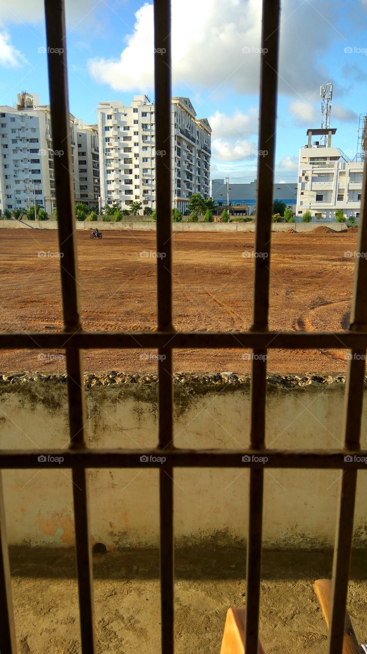 Window out side location big buldings with sky