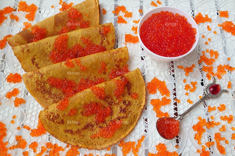 Pancakes with red caviar