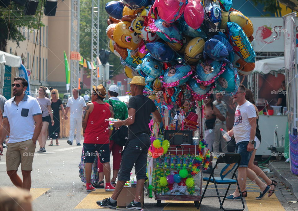 Street Photography.Street Vendor Selling Balloons.Caliente Festival.Zürich