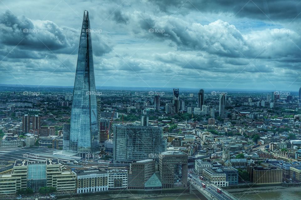 The Shard in London with dramatic clouds in the background.